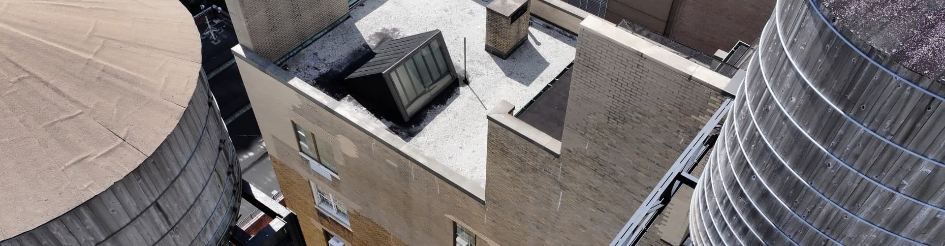 Aerial drone view of a New York City parapet and roof